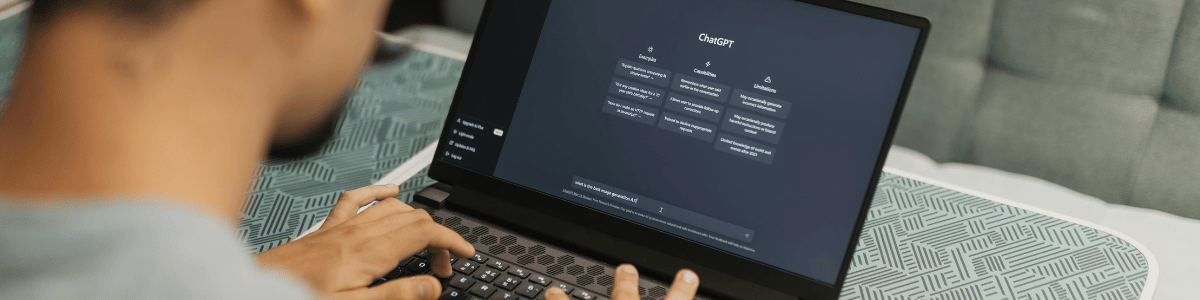 A man using ChatGPT on his computer